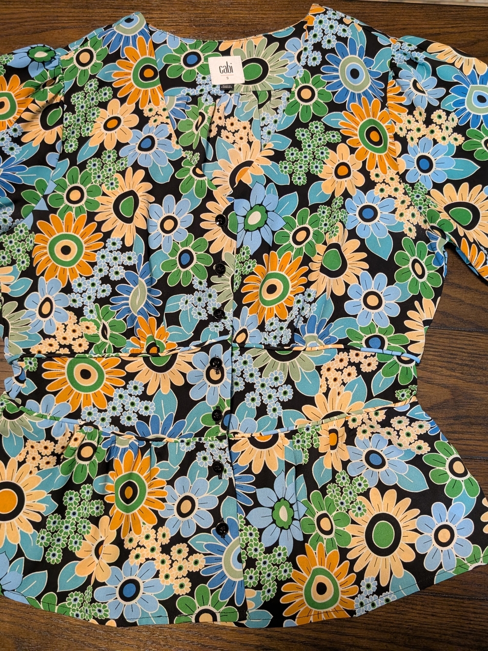 CAbi Floral Button-Front Peplum Top in Black, Blue, Green, Orange